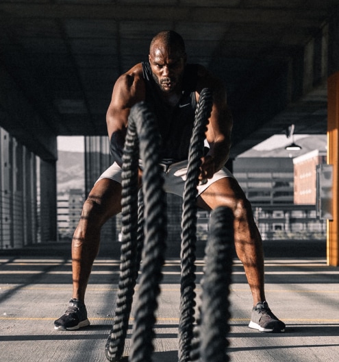 Man Working out with battle ropes